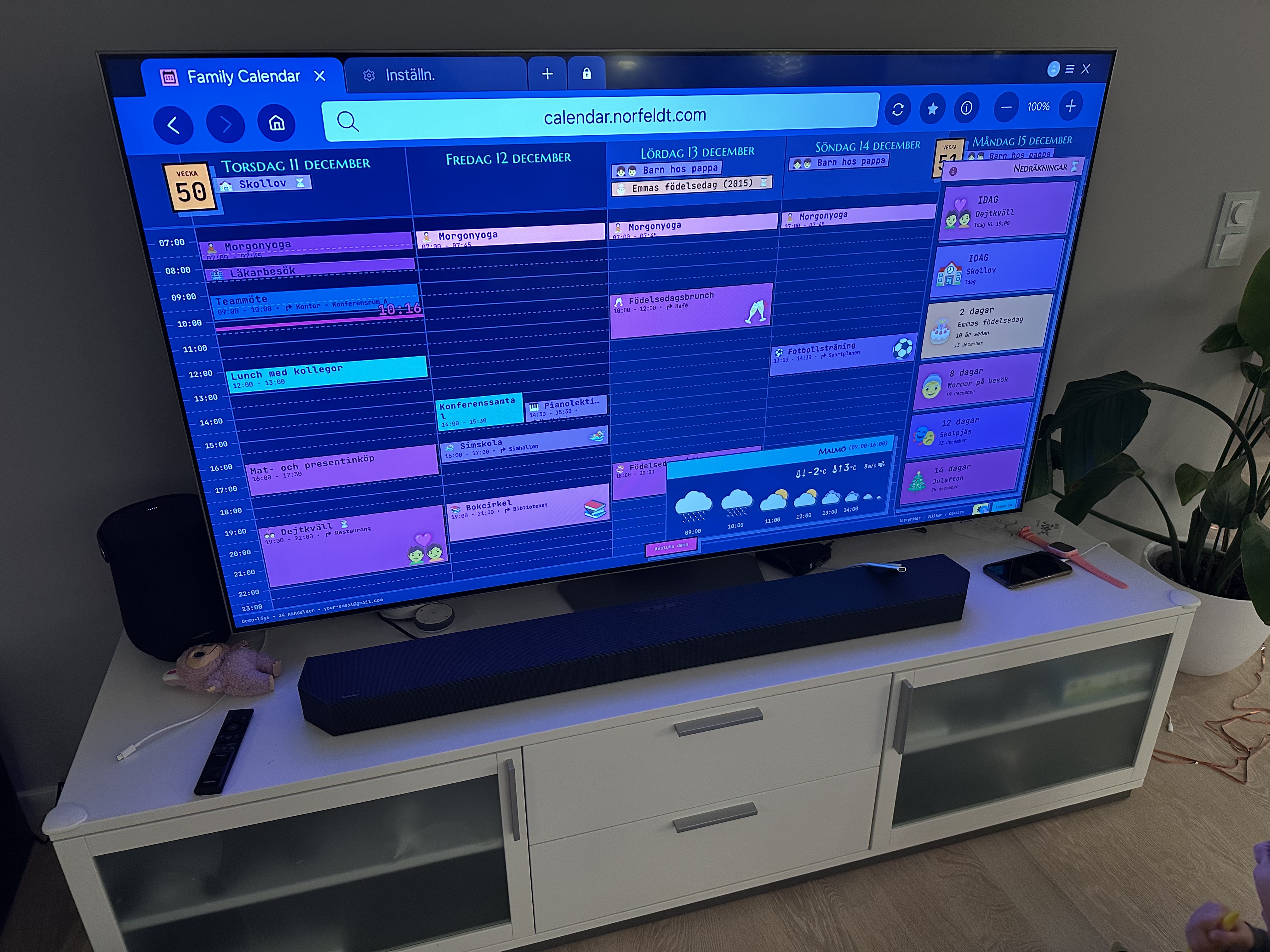 Smart TV in living room displaying family calendar on the big screen